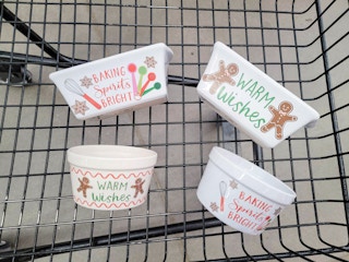 holiday themed baking pans in a cart