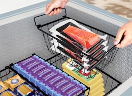 baskets in a deep freezer filled with food packages 