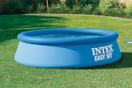 an intex pool in a yard