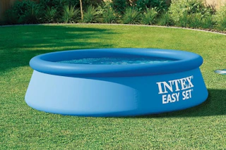 an intex pool in a yard