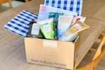 a Bath & Body Works shipping box with products in it