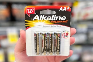 hand holding batteries