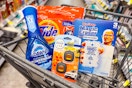 dawn powerwash, febreze car clips, tide pods, and mr clean magic erasers in a cart