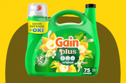 a green bottle of laundry detergent