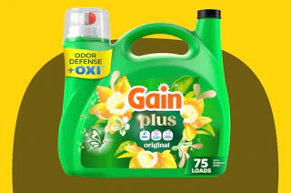 a green bottle of laundry detergent