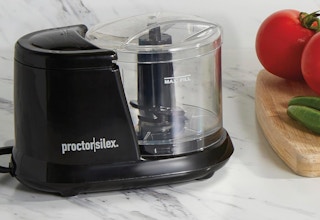 an electric vegetable chopper on a kitchen counter