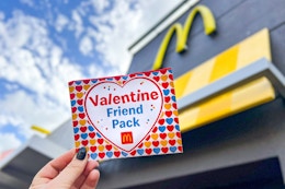 someone holding up a valentine friend pack at mcdonalds