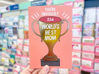 hand holding Hallmark card