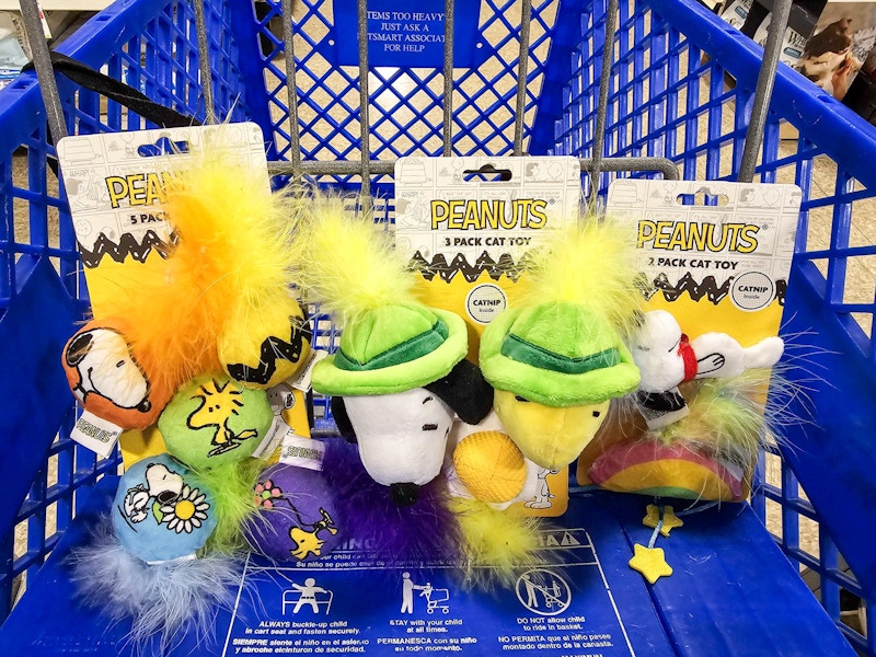 peanuts cat toys in a cart