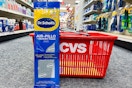 memory foam insoles in front of a cvs basket on the floor of a shopping aisle