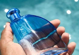 a blue bottle of cologne 