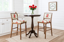 Feature image created by ChatGPT of The Pioneer Woman vintage flower stool set in kitchen setting