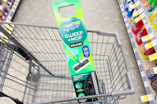 swiffer deluxe sweep and mop kit in a cart
