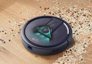 Anker Eufy robot vacuum sucking up crumbs
