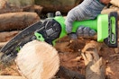 Person using the  Tietoc Chainsaw 6 Inch Mini Electric Chainsaw on a log.