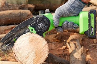 Person using the  Tietoc Chainsaw 6 Inch Mini Electric Chainsaw on a log.