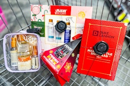 tree hut, axe, duke cannon, and raw sugar gift sets in a cart
