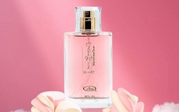 a pink bottle of perfume 