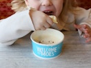 young child eating chips and queso at moes southwest grill
