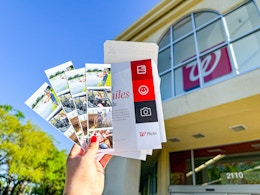 hand holding walgreens photo bookmarks
