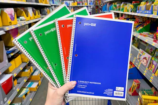 four pen+gear 1-subject notebooks held in center of walmart aisle