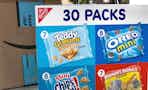 30-pack box of nabisco snacks on counter next to amazon box