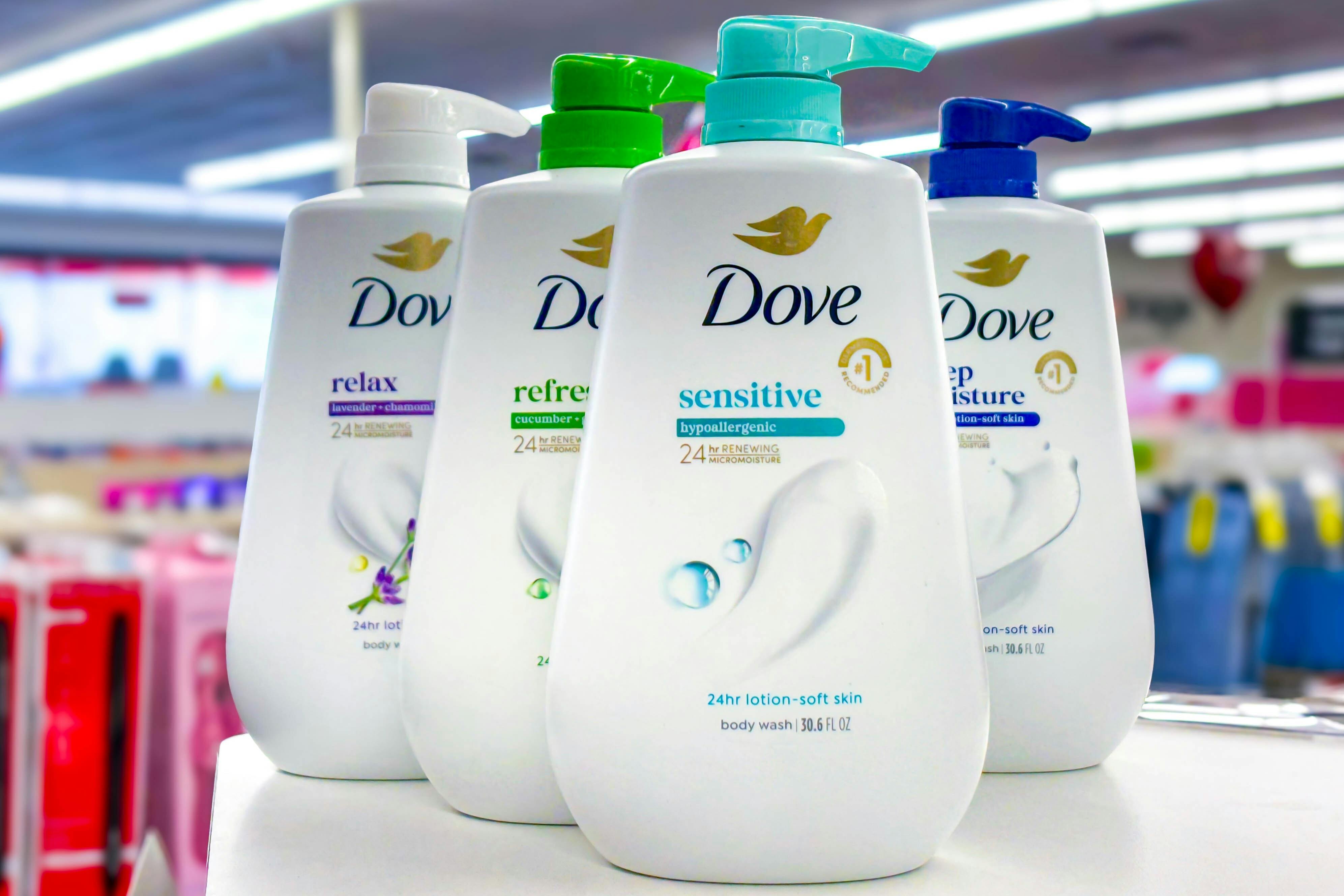 dove pump body wash bottles on a shelf