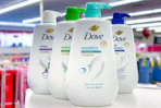 dove pump body wash bottles on a shelf