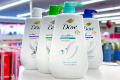 dove pump body wash bottles on a shelf