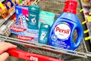 colgate toothpaste, degree deodorant, oreo cookies, skintimate razors, and persil detergent in a cart