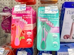 skintimate razors on peg wall at cvs