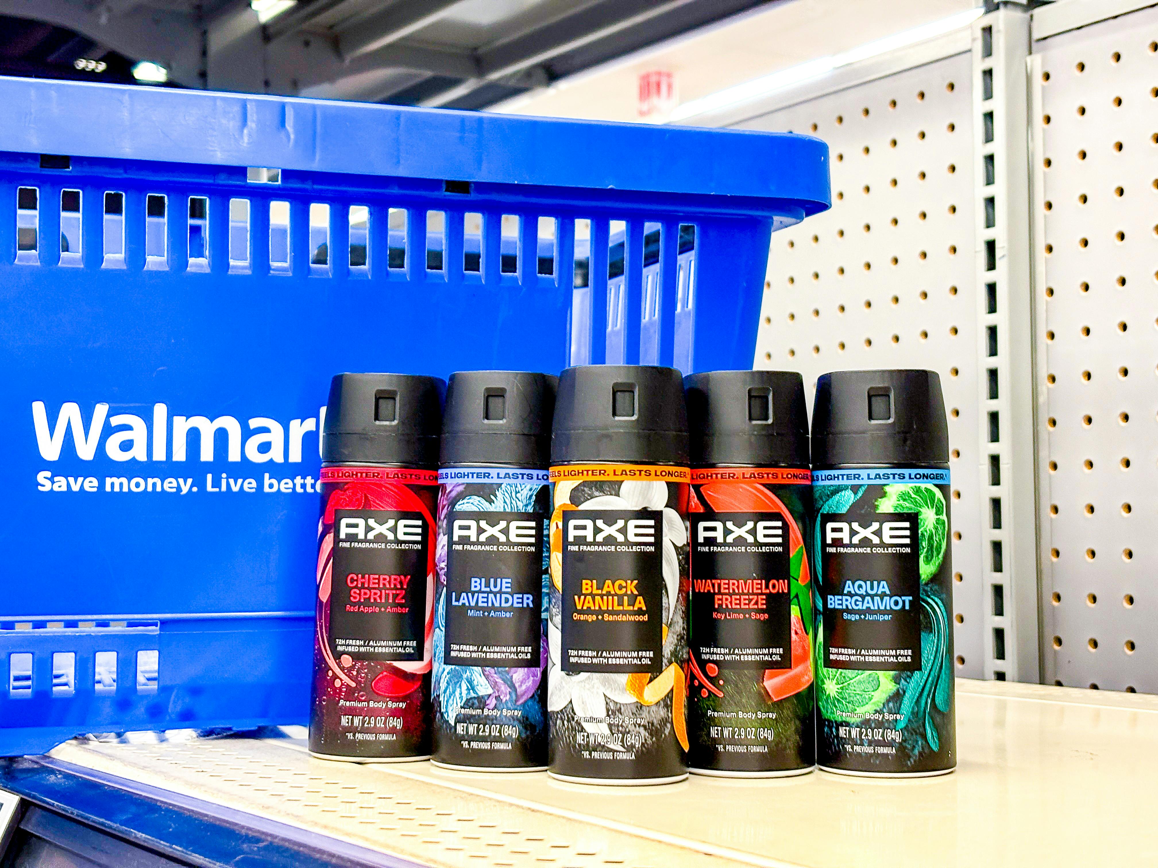 five axe body spray in front of walmart hand cart on shelf