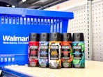 five axe body spray in front of walmart hand cart on shelf