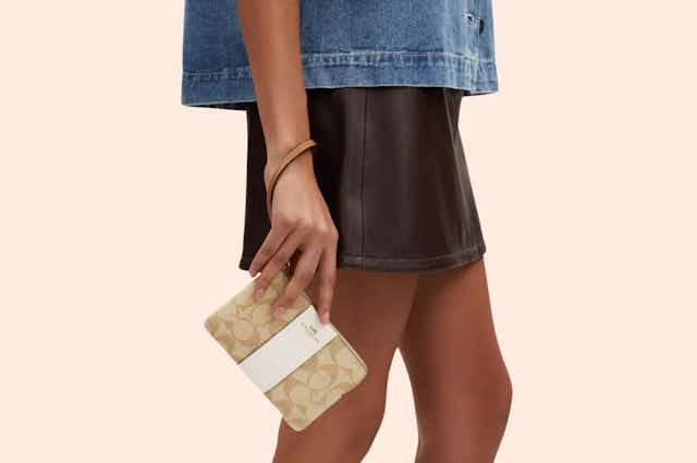 Buy Designer on a Budget — $25 Wristlets at the Coach Outlet card image