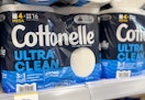close-up view of toilet paper packs on store shelf