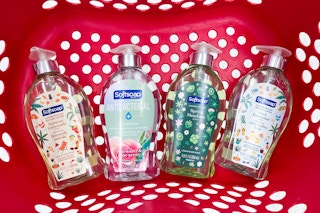4 softsoap hand soap sitting in a target basket
