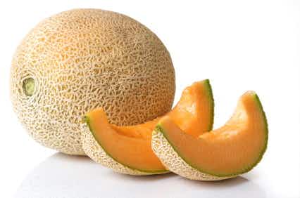 Fresh, juicy cantaloupe with slices ready to eat