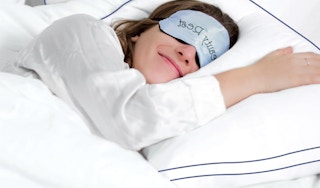 a person sleeping on a pillow