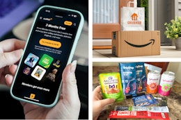 someone holding a phone showing an offer on audible, grubhub bag on an amazon box, and amazon samples