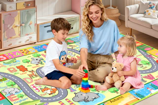 family sitting on area rug