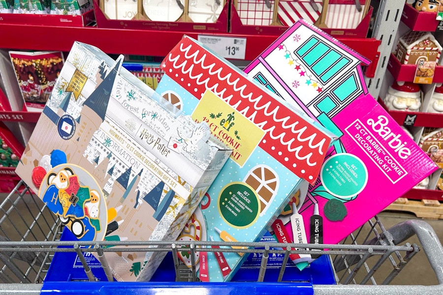 harry potter, elf, and barbie cookie decorating kits in a cart