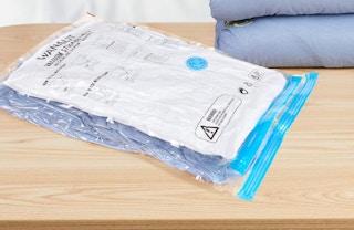 vacuum bags with clothes in a suitcase