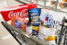 coca-cola, cape cod, perdue, kinder's and johnsonville products in a black meijer shopping cart