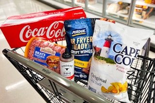coca-cola, cape cod, perdue, kinder's and johnsonville products in a black meijer shopping cart