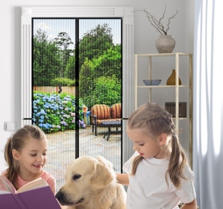 Children sitting in front of a magnetic screen door with a dog.