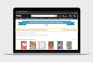 a laptop displaying a users digital reward balance