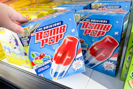 hand grabbing a box of bomb pops
