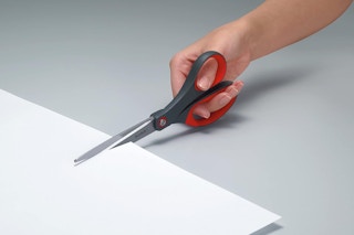 scissors cutting a piece of paper