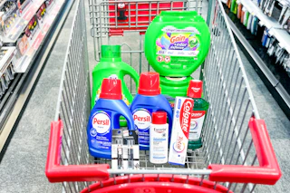 gain and persil detergents, covergirl makeup, eucerin lotion, and colgate oral care in a cart