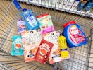 Various products spread out inside a Walmart shopping cart